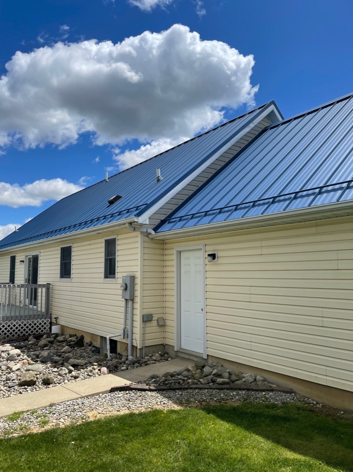 Big Dog Roofing team member working on a residential roofing project