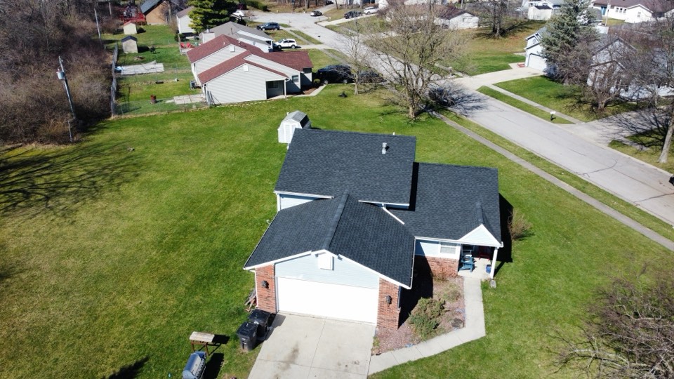Aerial photo of a completed Big Dog Roofing project in a Northeast Indiana neighborhood